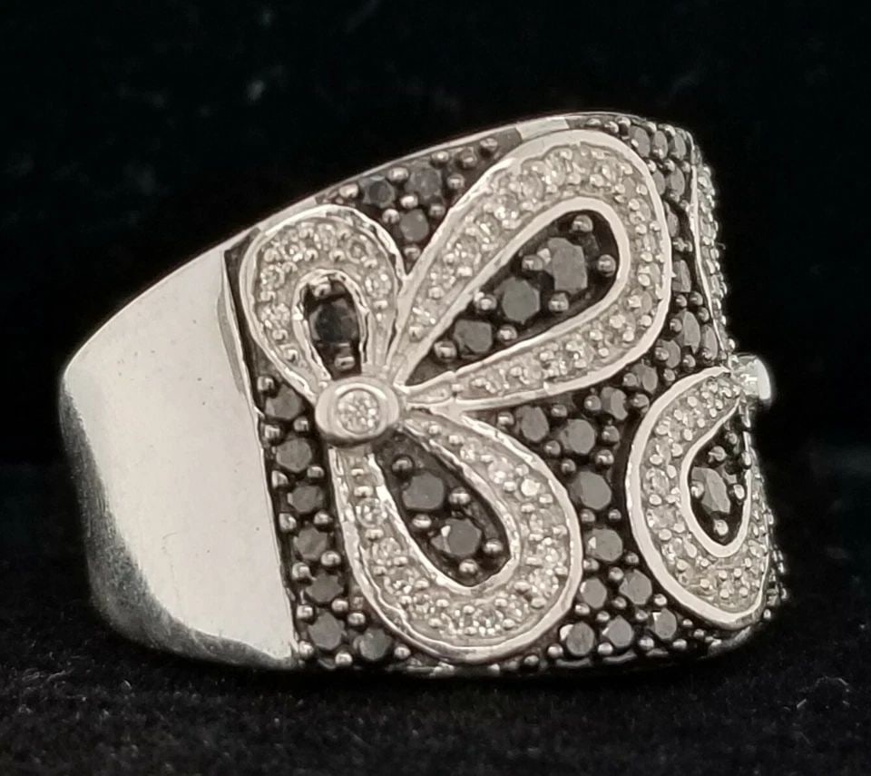 14K WHITE GOLD RING 1.45CT NATURAL DIAMOND SI1-H: 14K WHITE GOLD RING 1.45CT NATURAL DIAMOND SI1-H GORGEOUS 14k WHITE GOLD ring set Natural round black diamond total weight 1.00ct . Set natural white diamond weight 0.45ct. beautiful setting ,very liv