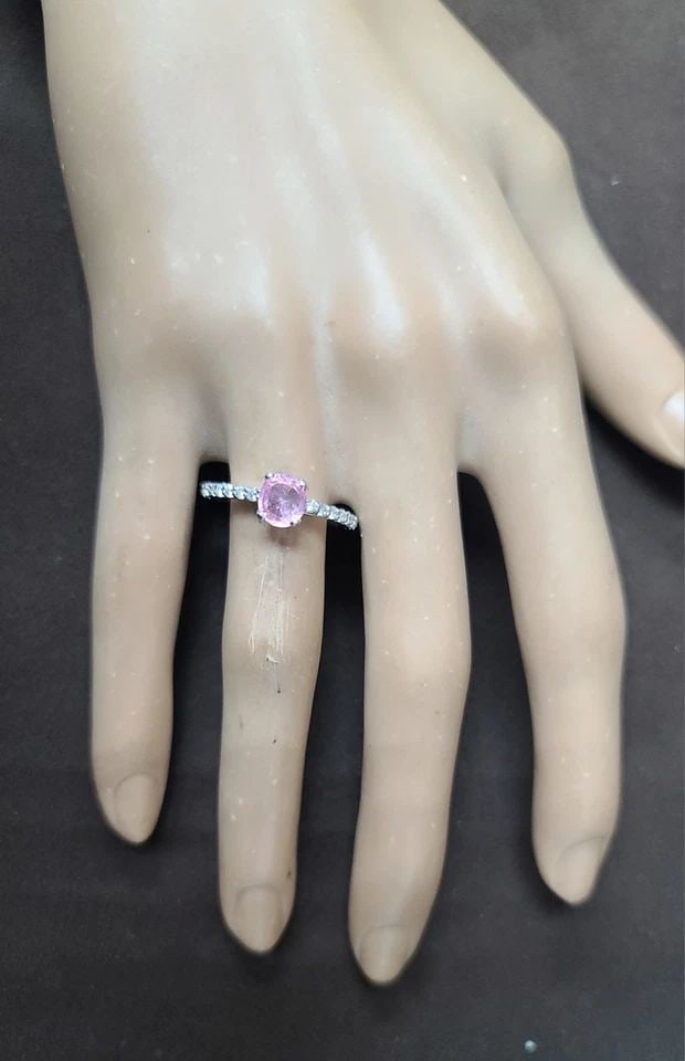 14K WHITE GOLD ENGAGEMENT RING 1.04CT.NATURAL UNTREATED PADPARADCHA SAPPHIRE: This exquisite 14k white gold ring is the perfect choice for any special occasion, whether it be an engagement, anniversary, or birthday. The stunning 1.04ct natural, untreated padparadcha sapphire is