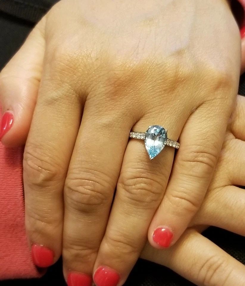 PLATINUM VINTAGE 3.24CT. NATURAL BLUE SKY AQUAMARINE PEAR SHAPE ENGAGEMENT RING: PLATINUM VINTAGE 3.24CT. NATURAL BLUE SKY AQUAMARINE PEAR SHAPE ENGAGEMENT RING GORGEOUS platinum natural aquamarine ring center natural aquamarine pear shape weight 3.24ct. size 11x8mm very lively ,v