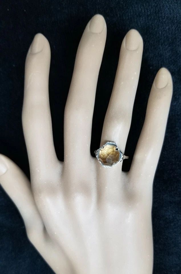 VINTAGE PLATINUM ENGAGEMENT RING 2.67CT. GOLDEN CITRINE OCTAGON ROSE CUT: VINTAGE PLATINUM ENGAGEMENT RING 2.67CT. GOLDEN CITRINE OCTAGON ROSE CUT This vintage platinum engagement ring is a true statement piece. The ring features a stunning golden citrine octagon rose cut s