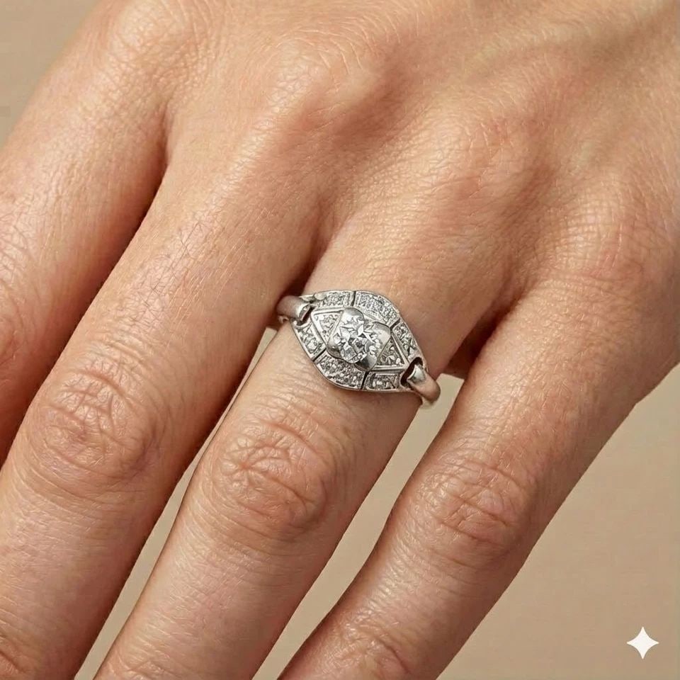 PLATINUM VINTAGE ENGAGEMENT RING 0.57CT. NATURAL OLD EURO ROUND DIAMOND: PLATINUM VINTAGE ENGAGEMENT RING 0.57CT. NATURAL OLD EURO ROUND DIAMOND Beautiful vintage platinum ring featuring a natural round old mine cut diamond, dating to the 1930s. Details: Center stone: Natu