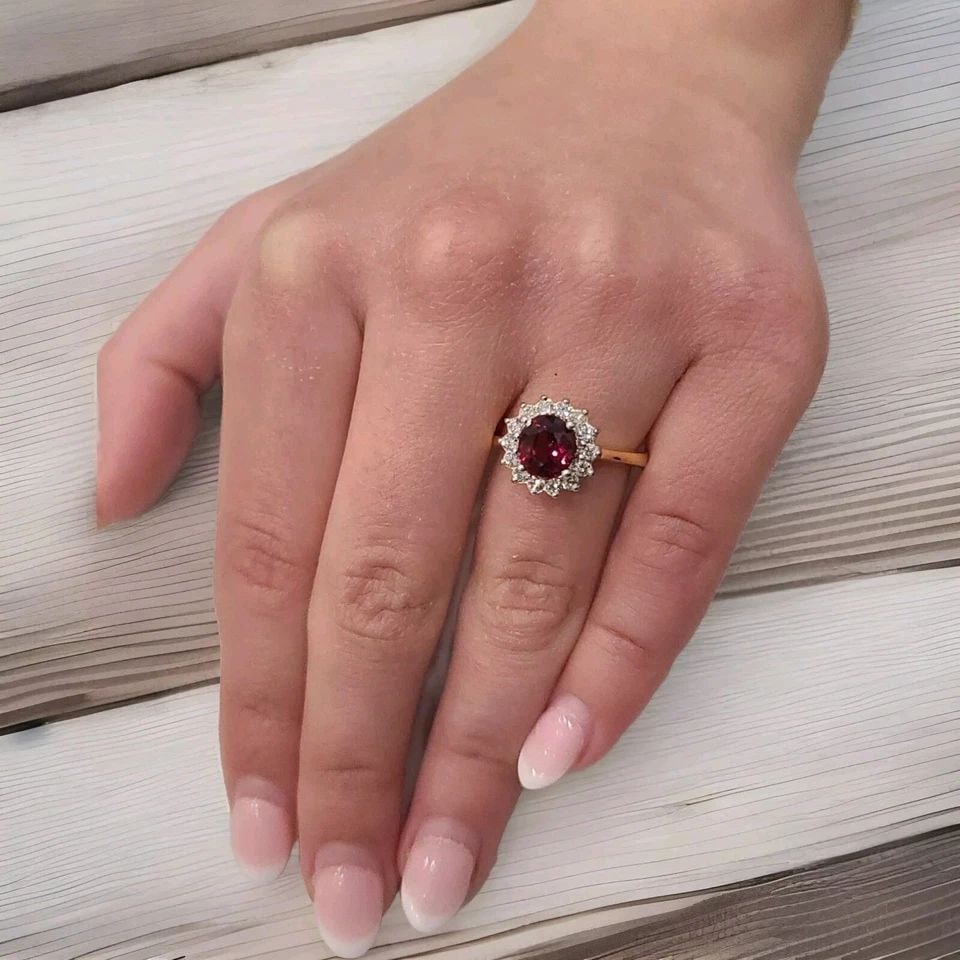 14K YELLOW GOLD ENGAGEMENT RING 1.70CT. NATURAL RED GARNET ROUND SHAPE: 14K YELLOW GOLD ENGAGEMENT RING 1.70CT. NATURAL RED GARNET ROUND SHAPE This stunning 14K yellow gold engagement ring is perfect for any special occasion, from Christmas to Valentine's Day. The beautif