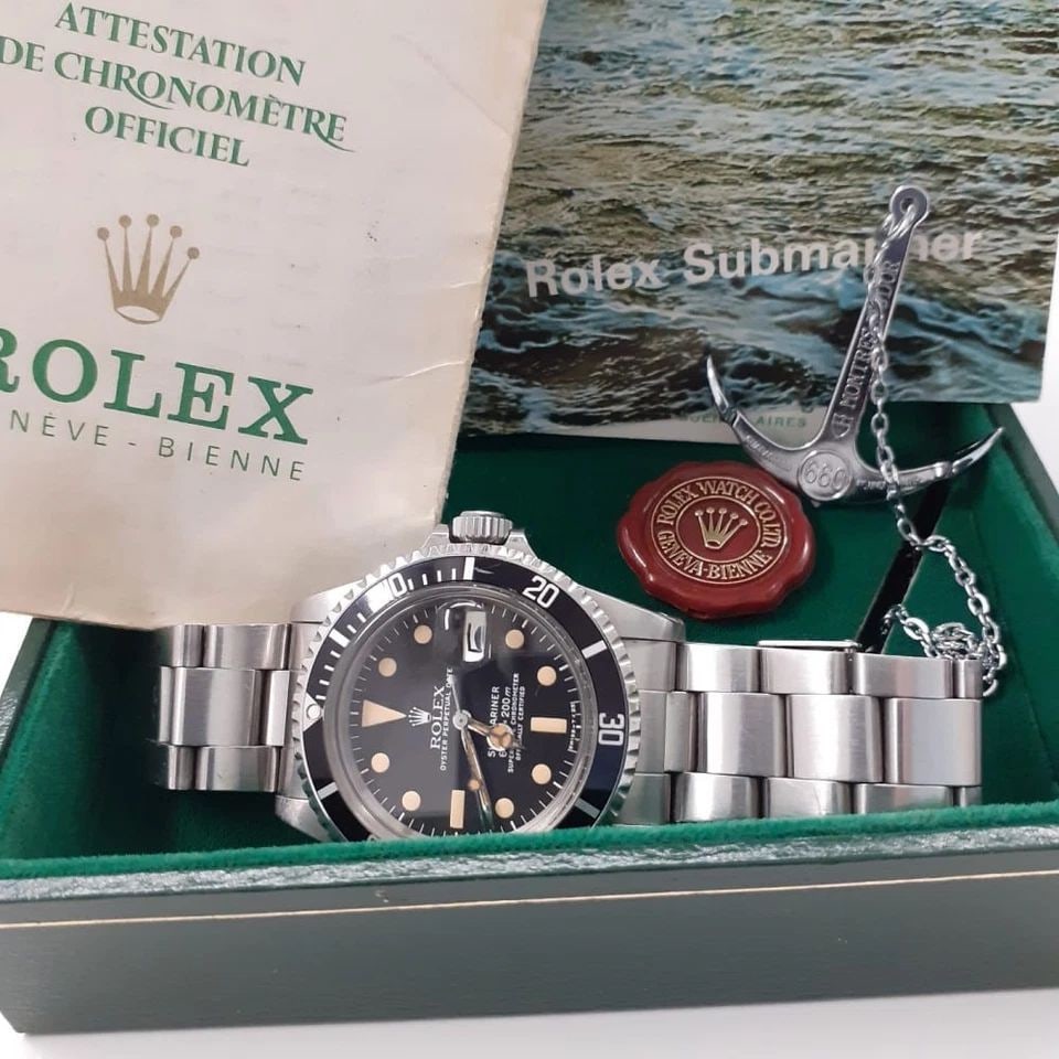 W/BOX PAPERS 1982 MINT ROLEX SUBMARINER 40 MM NEVER POLISH STEEL WATCH 1680: W/BOX PAPERS 1982 MINT ROLEX SUBMARINER 40 MM NEVER POLISH STEEL WATCH Manufacturer Rolex Category Submariner Subcategory Plastic Crystal Reference Number 1680 Additional Keywords MINT NEVER POLISH FU
