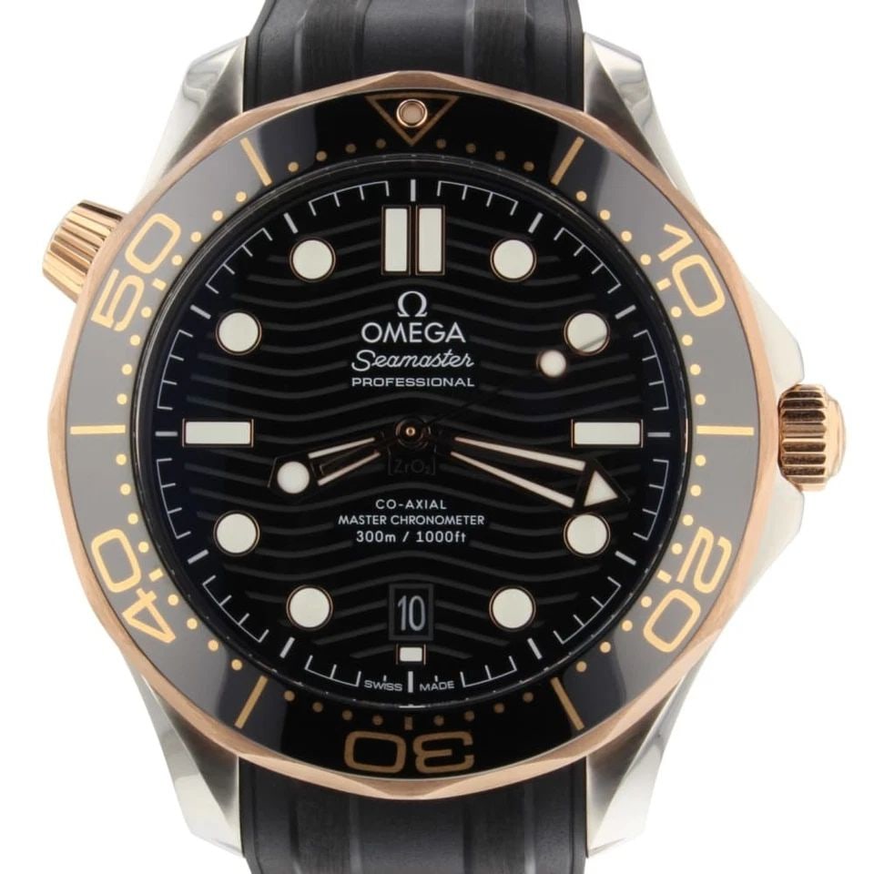 OMEGA SEAMASTER DIVER 300 M STEEL SEDNA GOLD 42 MM WATCH 210.22.42.20.01.002: OMEGA SEAMASTER DIVER 300 M STEEL SEDNA GOLD 42 MM WATCH Manufacturer Omega Category Seamaster Subcategory Diver 300M Reference Number 210.22.42.20.01.002 Band Color Black Band Type Rubber Strap Bezel