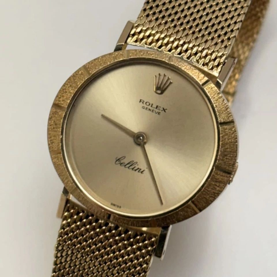 ROLEX CELLINI LADIES 24 X 27 MM 18K YELLOW GOLD MANUAL CHAMPAGNE DIAL WATCH: ROLEX CELLINI LADIES 24 X 27 MM 18K YELLOW GOLD MANUAL CHAMPAGNE DIAL WATCH Manufacturer Cellini Category Classic Ladies Band Type Integrated Bezel Smooth Bezel Box No Case Mes 24 X 27 mm Case Type Pr