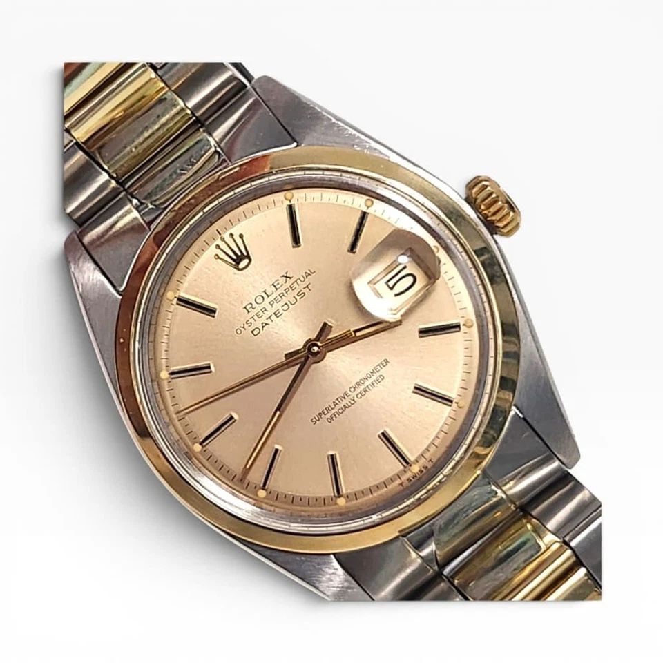 ROLEX DATEJUST 36 MM TWO TONE CHAMPAGNE OYSTER AUTOMATIC WATCH 1600 CIRCA 1973: ROLEX DATEJUST 36 MM TWO TONE CHAMPAGNE OYSTER AUTOMATIC WATCH 1600 CIRCA 1973 Manufacturer Rolex Category Mens Datejust 36mm Subcategory Plastic Crystal Non Quick Reference Number 1600 Band Steel ,Ye