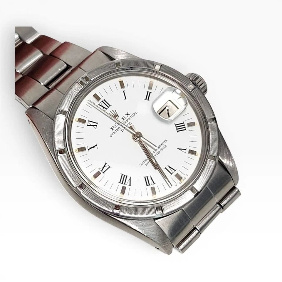 ROLEX DATE 34 MM OYSTER STEEL WHITE ROMAN AUTOMATIC WATCH 1501 CIRCA 1979: ROLEX DATE 34 MM OYSTER STEEL WHITE ROMAN AUTOMATIC WATCH 1501 CIRCA 1979 Manufacturer Rolex Category Mens Date 34mm Reference Number 1501 Band Stainless Steel Band Color Steel Band Type Oyster Bezel 