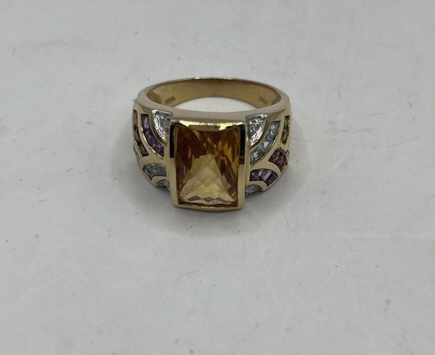 14K YELLOW GOLD RING FACETED CITRINE & DIAMONDS, BI TOPAZ, GARNET, AME SIZE 9: 14K YELLOW GOLD RING FACETED CITRINE & DIAMONDS, BI TOPAZ, GARNET, AME SIZE 9 14K YELLOW GOLD RING FACETED CITRINE & DIAMONDS, BI TOPAZ, GARNET, AME SIZE 9 Ring designed by Chuck Clemency in solid 14K