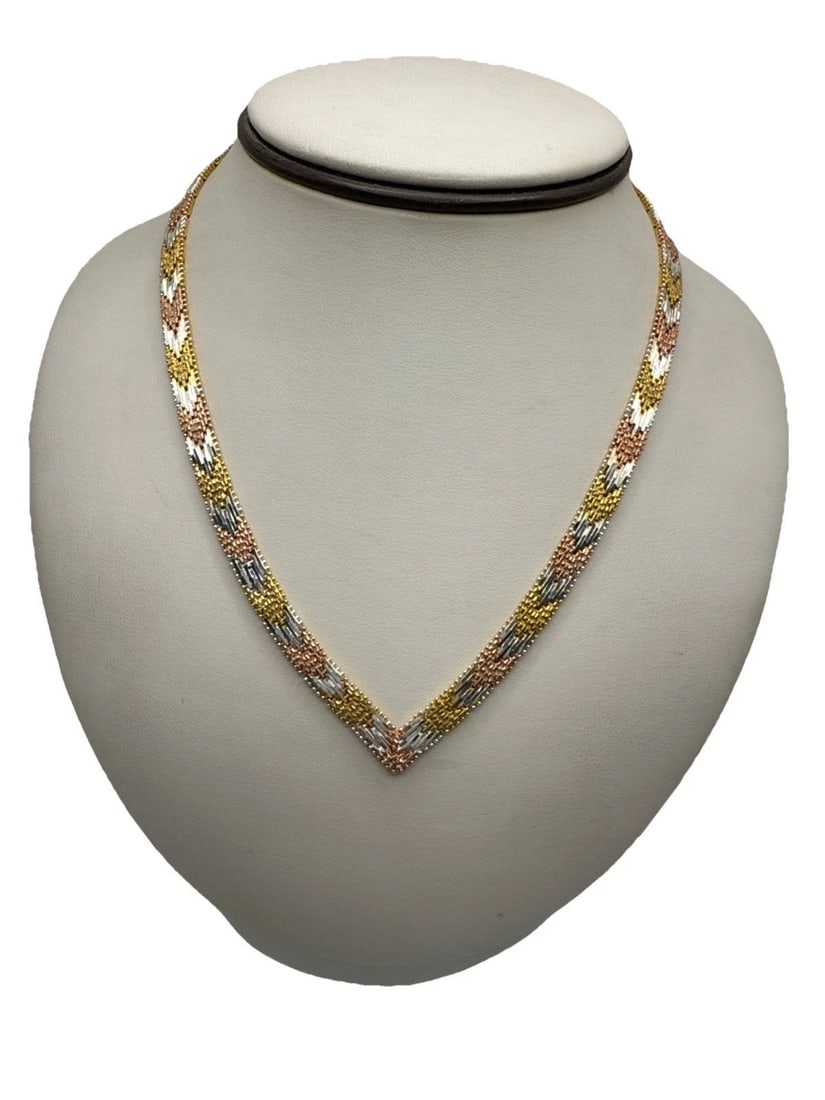 MULTI-TONE STERLING SILVER V POINTED FLAT NECKLACE 16" 32.3 GRAMS: MULTI-TONE STERLING SILVER V POINTED FLAT NECKLACE 16" 32.3 GRAMS This Multi-Tone Sterling Silver V Pointed Flat Necklace is a stylish and elegant piece of fine jewelry. The necklace is 16 inches long