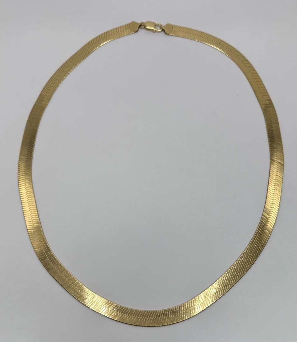 STERLING SILVER GOLD COLOR SNAKE LINK NECKLACE 32.1 GRAMS 18" LONG: STERLING SILVER GOLD COLOR SNAKE LINK NECKLACE 32.1 GRAMS 18" LONG STERLING SILVER GOLD COLOR SNAKE LINK NECKLACE 32.1 GRAMS 18" LONG Crafted in Italy, this Sterling Silver Gold Color Snake Link Neckl