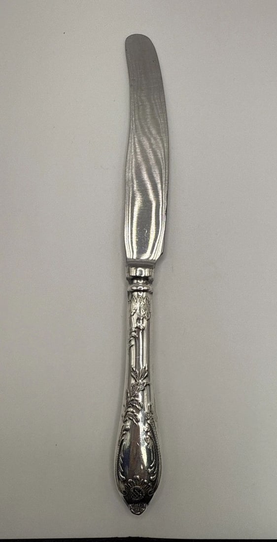 ELEGANT GERMAN KNIFE: ELEGANT GERMAN KNIFE The Elegant German Knife is a high-quality silverware set made by German Silver in the Victorian Classic style. The knives feature a Century pattern and are composed of German sil