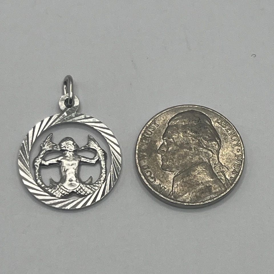 AQUARIUS STERLING SILVER CHARM (1 of 1)