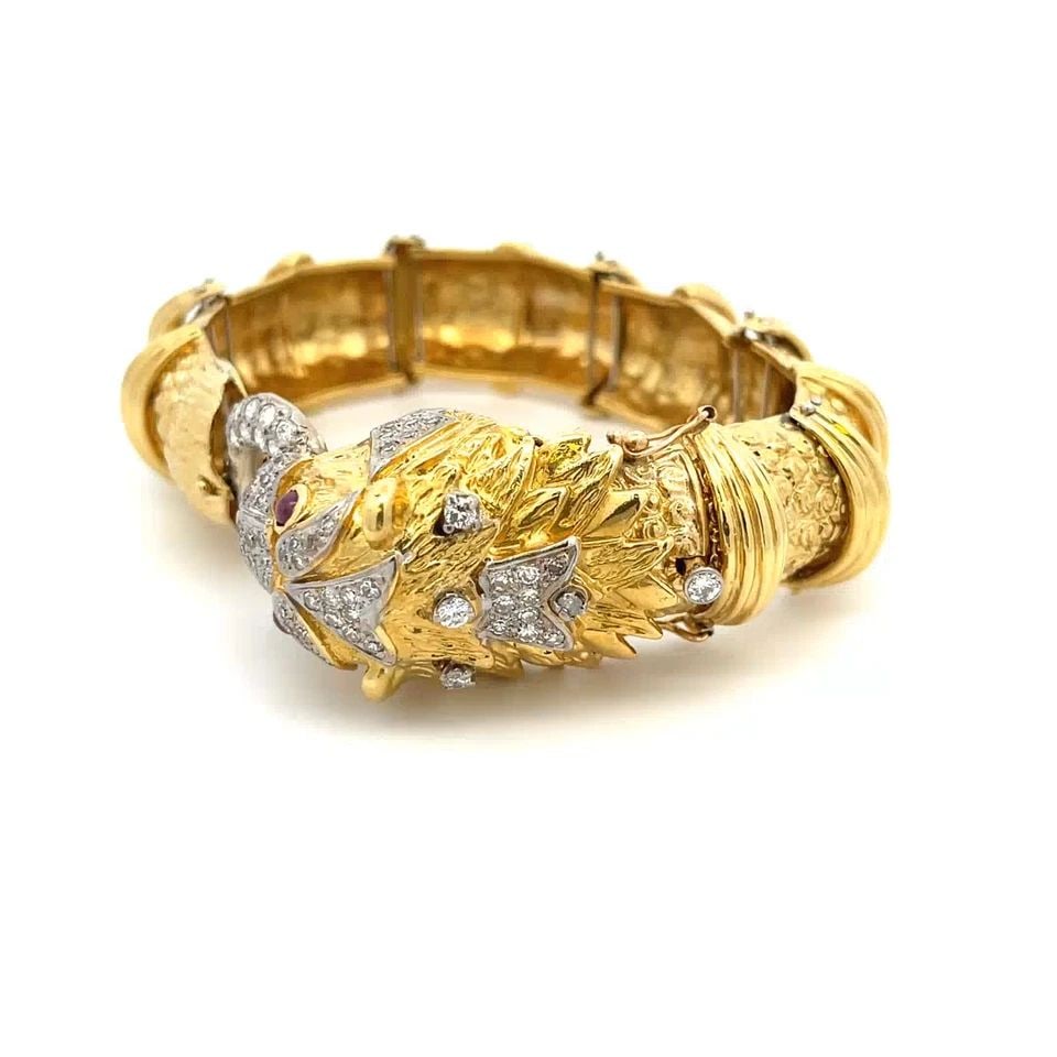 !8K LARGE DIAMOND RUBY DRAGON HEAD DOOR KNOCKER FLEX DOME LINK BRACELET: !8K LARGE DIAMOND RUBY DRAGON HEAD DOOR KNOCKER FLEX DOME LINK BRACELET This is a magnificent 18k yellow and white gold bracelet. It is well crafted in 18k yellow gold with white gold accent featuring