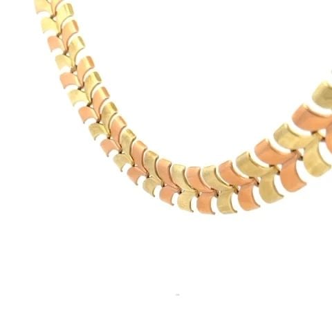 TIFFANY & CO. VINTAGE 14K YELLOW ROSE GOLD WING LINK COLLAR NECKLACE: TIFFANY & CO. VINTAGE 14K YELLOW ROSE GOLD WING LINK COLLAR NECKLACE This gorgeous collar necklace is authentic by Tiffany & Co. It is vintage and crafted from 14k yellow and rose gold featuring 17.45