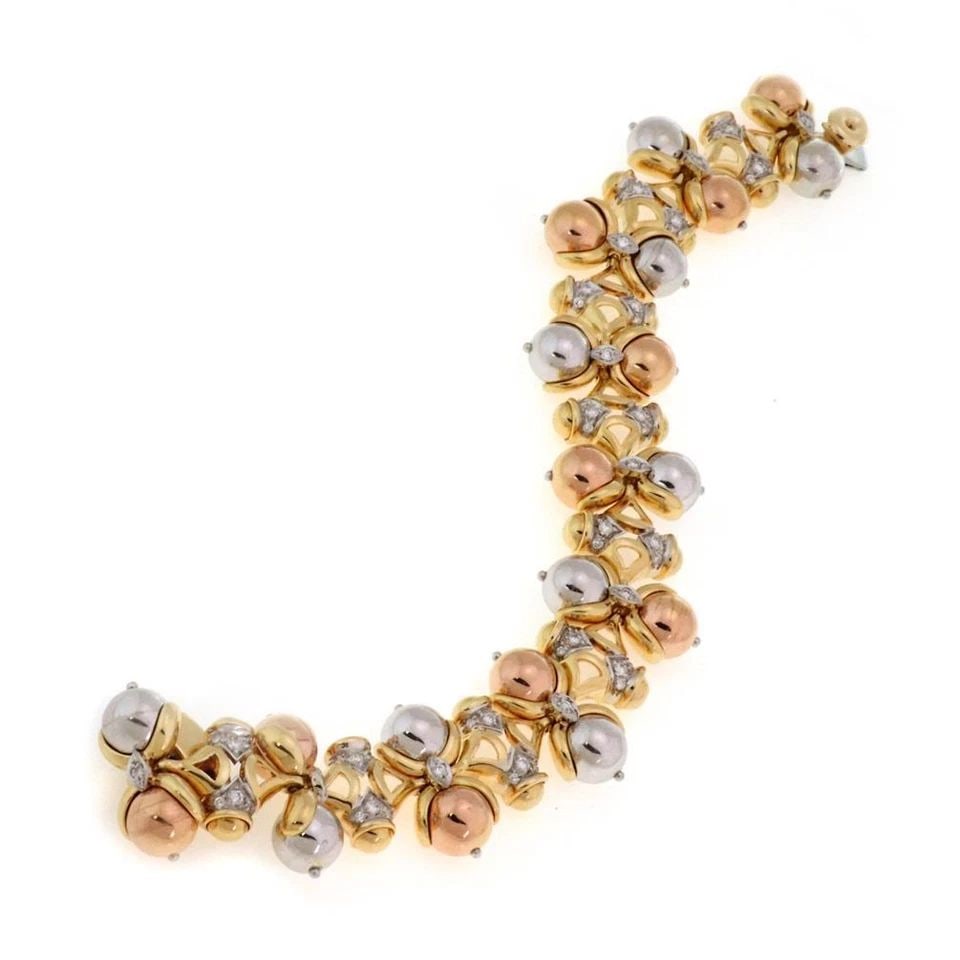 LOVELY 1.00CT DIAMOND 18K TRICOLOR GOLD FANCY BEAD LINK BRACELET LIQUIDATION: LOVELY 1.00CT DIAMOND 18K TRICOLOR GOLD FANCY BEAD LINK BRACELET Lovely 1.00ct Diamond 18k Tricolor Gold Fancy Bead Link Bracelet Description This is an eye catching fancy link bracelet, it is crafted