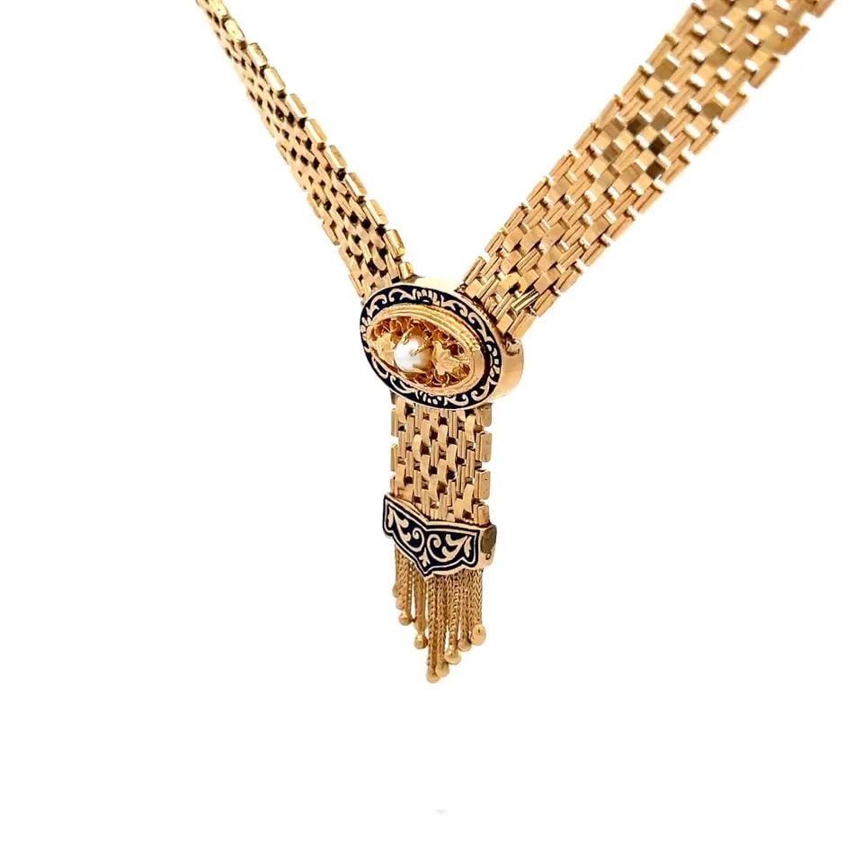 14K ENAMEL PEARL NECKLACE OVAL TASSEL PENDANT WIDE IN YELLOW GOLD: 14K ENAMEL PEARL NECKLACE OVAL TASSEL PENDANT WIDE IN YELLOW GOLD This lovely oval and tassel pendant necklace is crafted from 14k yellow gold featuring a 10.5mm Criss cross link necklace with slide c