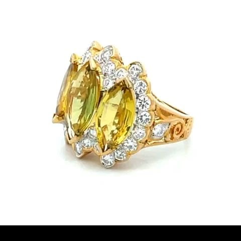 LOVELY YELLOW SAPPHIRE & DIAMOND 18K YELLOW GOLD COCKTAIL RING: LOVELY YELLOW SAPPHIRE & DIAMOND 18K YELLOW GOLD COCKTAIL RING This is a stunning cocktail ring, from 18k yellow gold in a fine polished finish. It is exquisitely crafted in 18k yellow gold with a smo