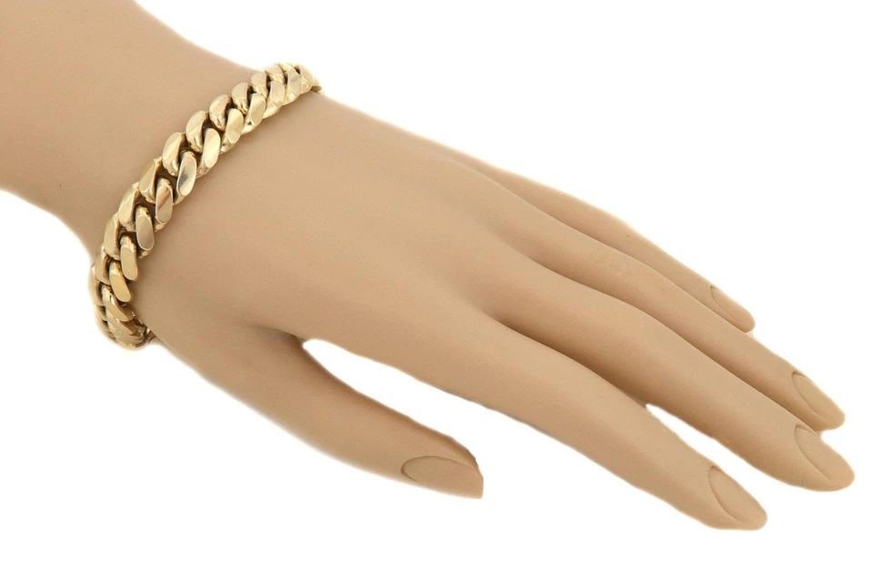 MEN'S 14K YELLOW GOLD 11.5MM WIDE CURB LINK BRACELET 92GR! LIQUIDATION: MEN'S 14K YELLOW GOLD 11.5MM WIDE CURB LINK BRACELET 92GR! Men's 14k Yellow Gold 11.5mm Wide Curb Link Bracelet 92gr! Description This is a solid 14k yellow gold men's curb link chain bracelet, it is 