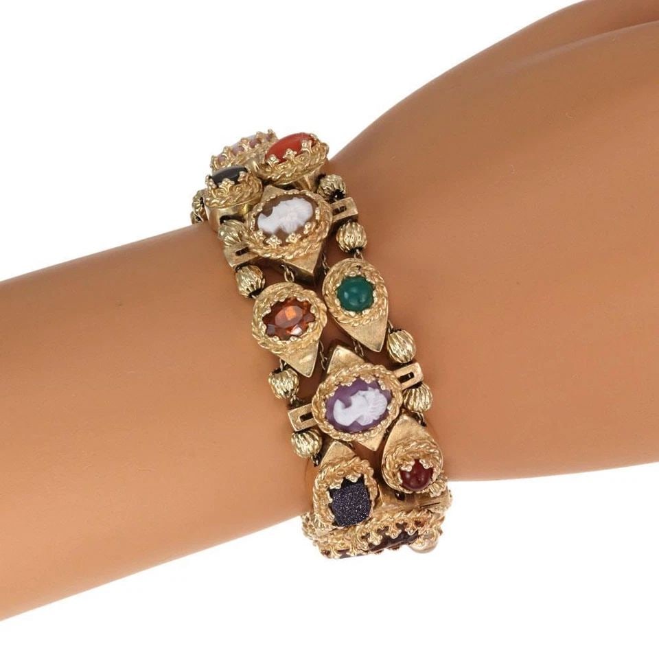 CHARMS SLIDE BRACELET 14K VINTAGE TRIPLE ROW YELLOW GOLD MULTICOLOR GEMS 21: CHARMS SLIDE BRACELET 14K VINTAGE TRIPLE ROW YELLOW GOLD MULTICOLOR GEMS 21 This fabulous Estate piece is finely crafted from14k yellow gold. It features 21 assorted shape and size 4 chain strand slid