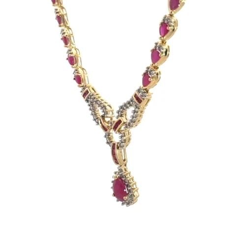 DIAMOND RUBY COCKTAIL NECKLACE 14K YELLOW GOLD DANGLE PENDANT: DIAMOND RUBY COCKTAIL NECKLACE 14K YELLOW GOLD DANGLE PENDANT This is a beautiful cocktail necklace: it is crafted from 14k yellow gold featuring a full circle necklace with small pear shape ruby on p