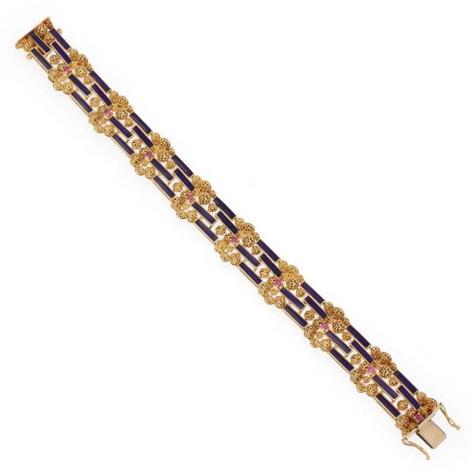 VINTAGE RUBY ENAMEL 18K YELLOW GOLD 15MM WIDE FANCY BRACELET LIQUIDATION: VINTAGE RUBY ENAMEL 18K YELLOW GOLD 15MM WIDE FANCY BRACELET Vintage Ruby Enamel 18k Yellow Gold 15mm Wide Fancy Bracelet Description This is a lovely ruby and enamel bracelet, crafted from 18k yellow