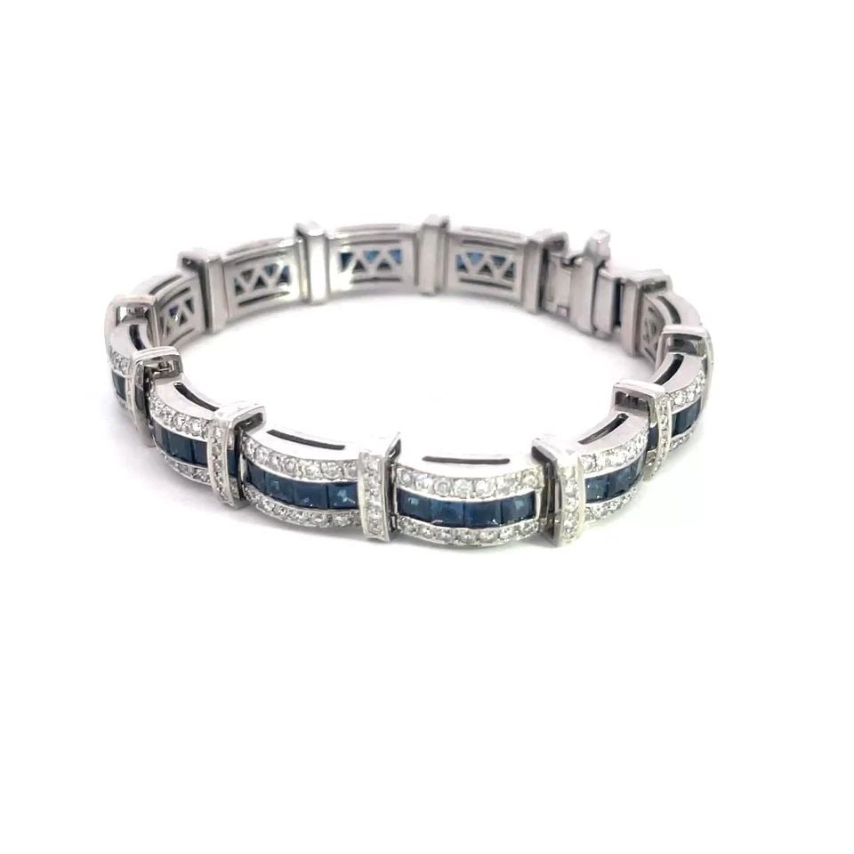 SAPPHIRE DIAMOND ESTATE GOLD BRACELET 18K WHITE CURVED BAR LINKS STYLE: SAPPHIRE DIAMOND ESTATE GOLD BRACELET 18K WHITE CURVED BAR LINKS STYLE This 18k white gold bracelet features beautiful, curved bar link with alternating slim cross bars, the curved bars have channel s