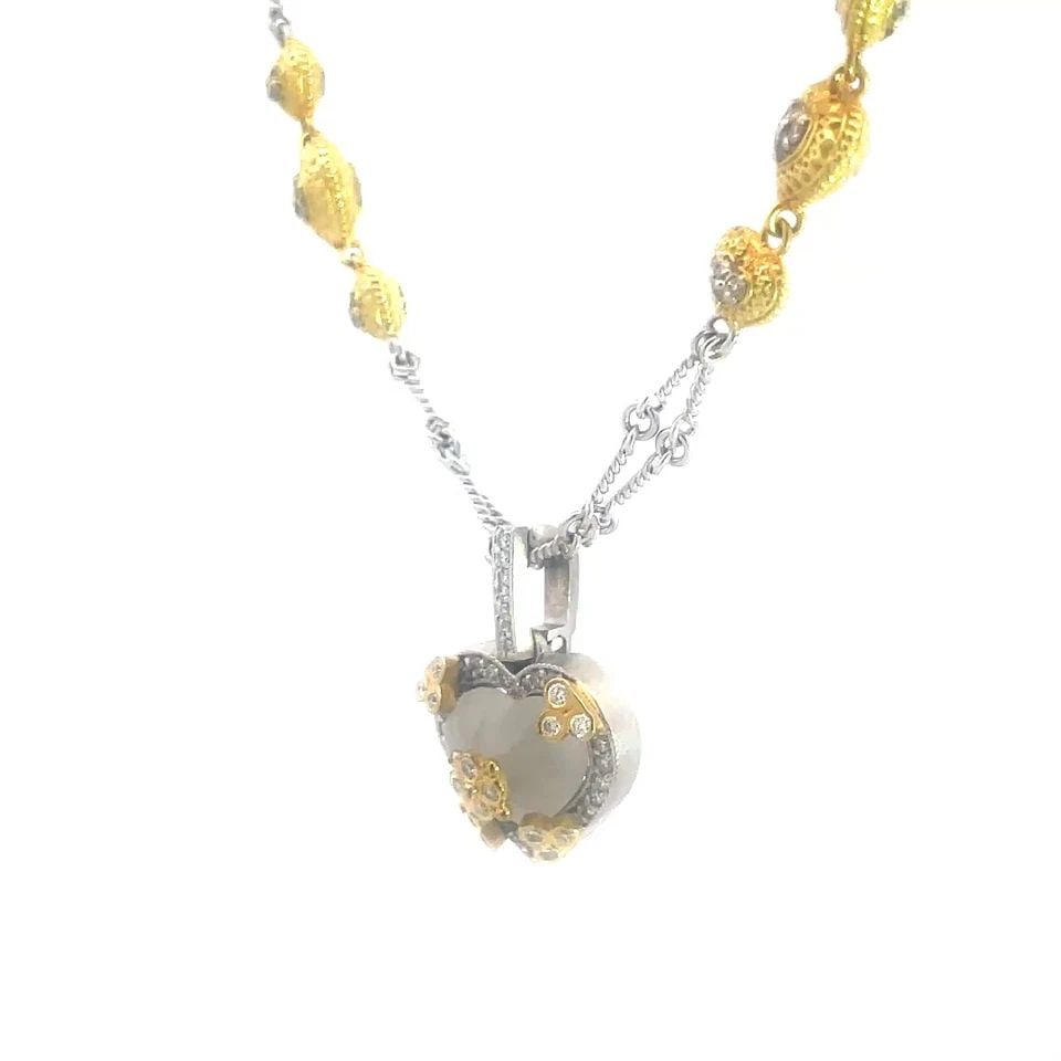 STAMBOLIAN DIAMOND GOLD HEART NECKLACE 18K TWO TONE FROSTED HEART PENDANT: STAMBOLIAN DIAMOND GOLD HEART NECKLACE 18K TWO TONE FROSTED HEART PENDANT This Stambolian diamond and gold necklace is a stunning piece of fine jewelry featuring double twisted wire links chain in 18k
