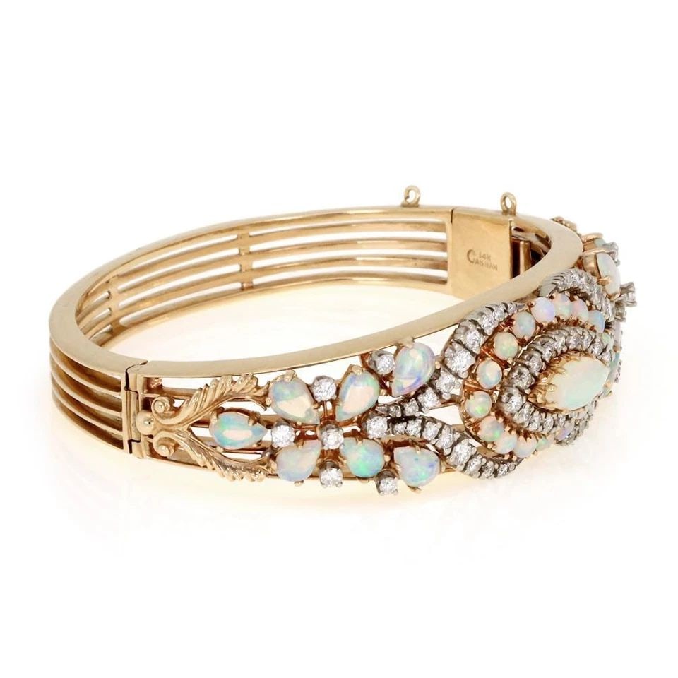 DIAMOND & OPAL 14K BRACELET YELLOW GOLD FLORAL WIDE VINTAGE BANGLE: DIAMOND & OPAL 14K BRACELET YELLOW GOLD FLORAL WIDE VINTAGE BANGLE Estate Diamond & Opal 14k Yellow Gold Floral Bangle Bracelet ! Description This is a gorgeous Estate bracelet, it is crafted from 14k