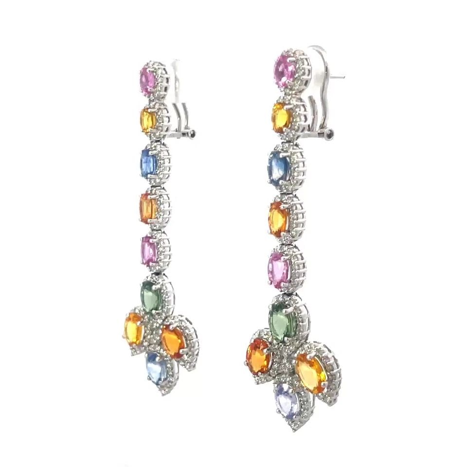 DIAMOND SAPPHIRE GOLD EARRINGS 18K WHITE FLORAL COLOR LONG DANGLE STYLE 16CT: DIAMOND SAPPHIRE GOLD EARRINGS 18K WHITE FLORAL COLOR LONG DANGLE STYLE 16CT These exotic long floral design earrings are crafted from 18k white gold featuring oval cut multi-color sapphires set in a 