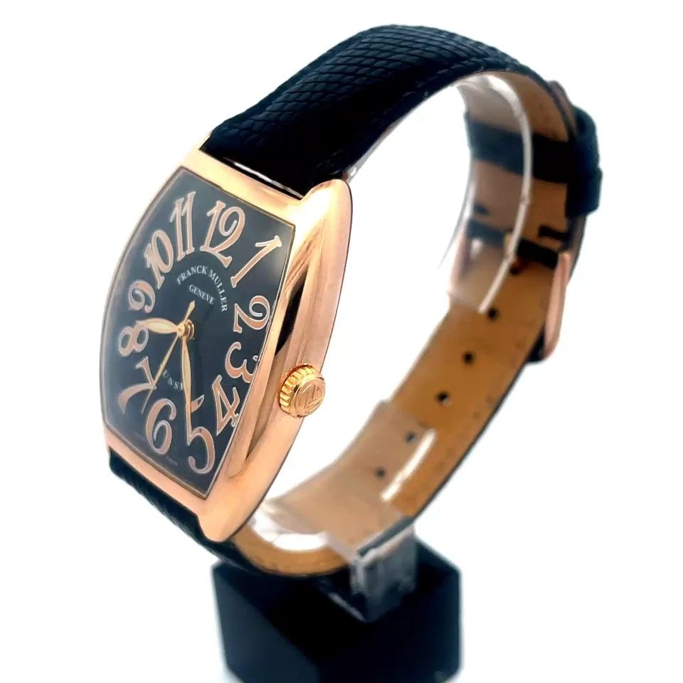FRANCK MULLER GOLD MEN'S WATCH CINTREE CURVEX 18K MASTER COMPLICATIONS 2852 SC: FRANCK MULLER ROSE GOLD MEN'S WATCH 18K MASTER OF COMPLICATIONS 2852 SC Elevate your style with the Franck Muller Master of Complications Men's Watch, model 2852SC. The case is crafted in 18k rose gol