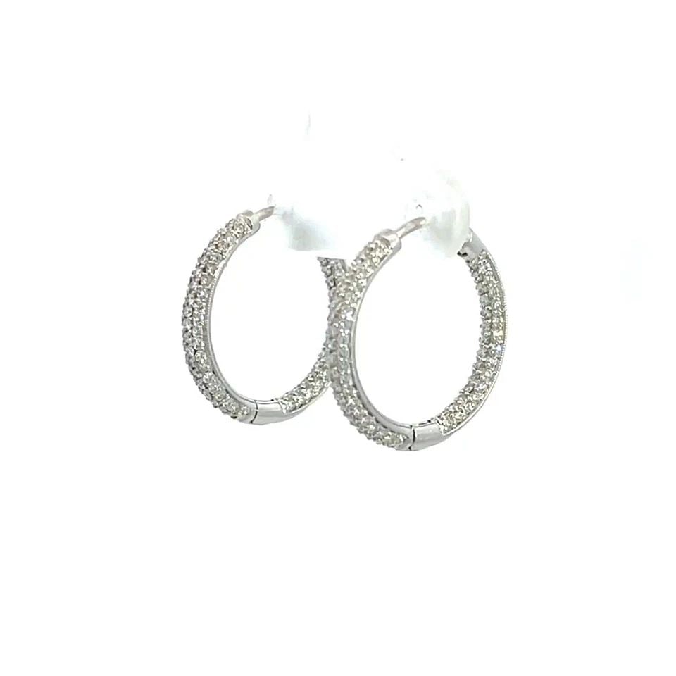 TIFFANY & CO INSIDE OUT DIAMONDS 18K WHITE GOLD SMALL HOOP EARRINGS: TIFFANY & CO INSIDE OUT DIAMONDS 18K WHITE GOLD SMALL HOOP EARRINGS These elegant earrings are from Tiffany & Co, they are well crafted from 18k white gold in a fine polished finish. The front half an
