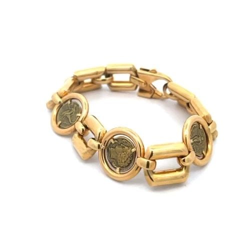 UNOARRE JEWELER COIN BRACELET IN 18K YELLOW GOLD OPEN LINK STYLE: UNOARRE JEWELER COIN BRACELET IN 18K YELLOW GOLD OPEN LINK STYLE This is a lovely bracelet by UNOAERRE Jeweler, it is crafted from 18k yellow gold featuring polished open rectangle puffed links with a