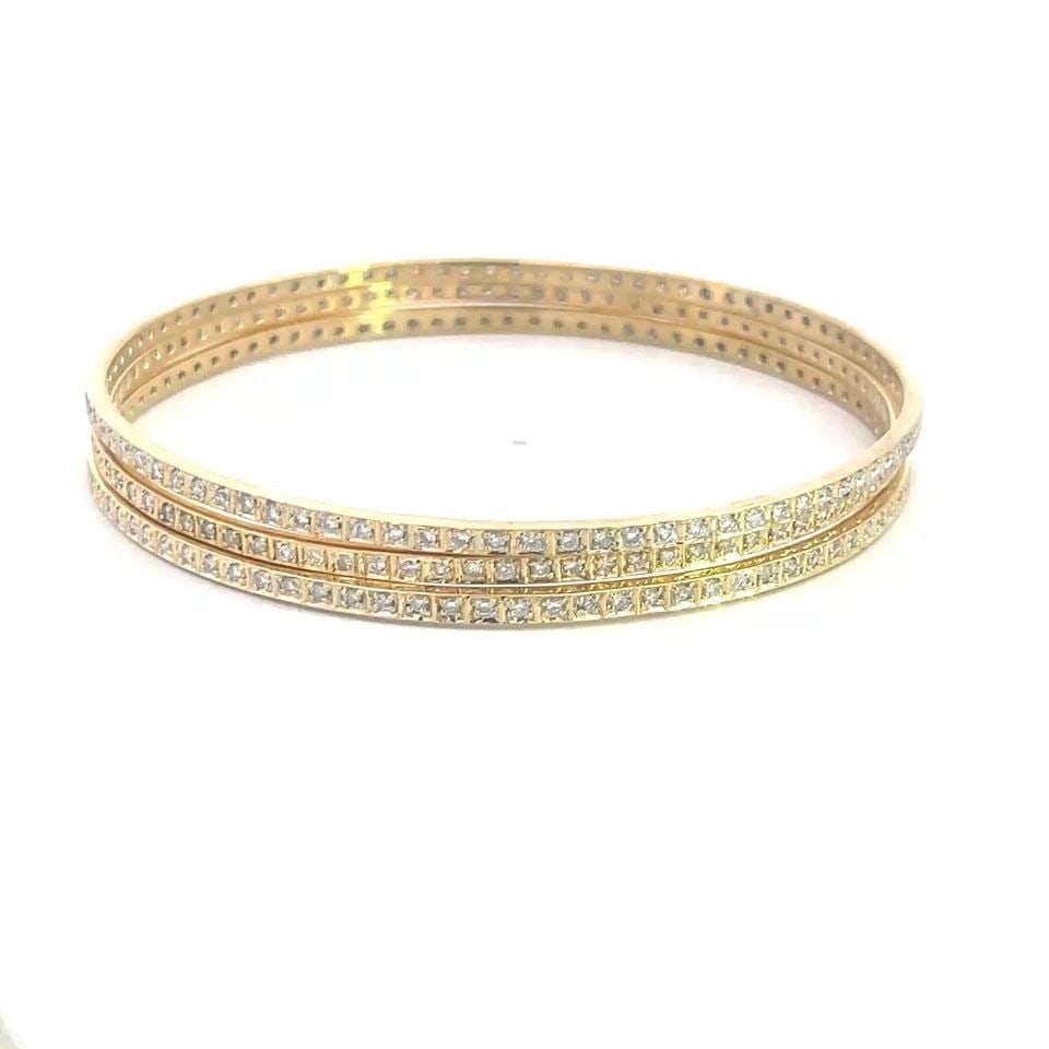 DIAMOND GOLD BANGLES SET OF 3 18K YELLOW 8"BRACELETS: DIAMOND GOLD BANGLES SET OF 3 18K YELLOW 8"BRACELETS This beautiful set of 3 bangles are crafted from 18k yellow gold, each is 2mm wide with a full circle prong set diamonds, each in a thin line gold 