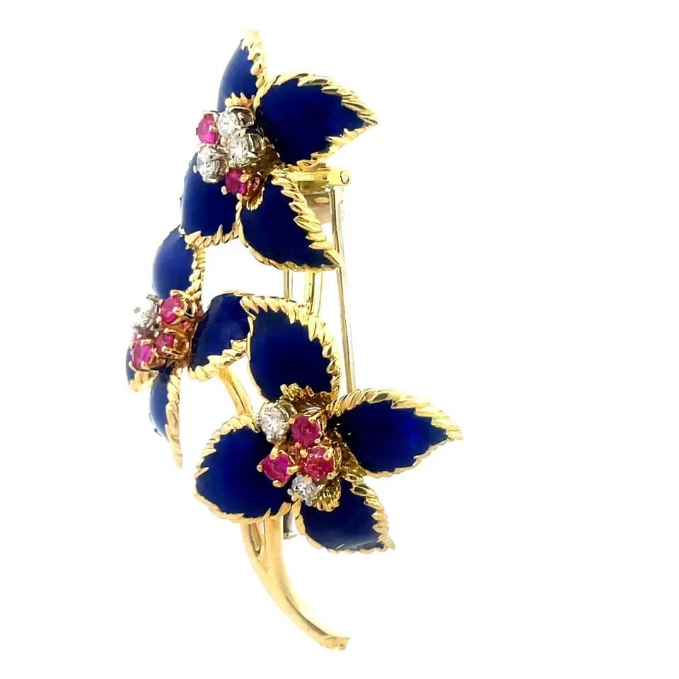 CORLETTO GOLD DIAMOND BROOCH 18K YELLOW ENAMEL RUBY SPRIG FLOWERS VINTAGE: This designer Corletto gold diamond brooch is a stunning piece of vintage jewelry featuring a beautiful design of yellow gold with blue enamel and ruby sprig flowers. Made of 18k yellow gold and set w