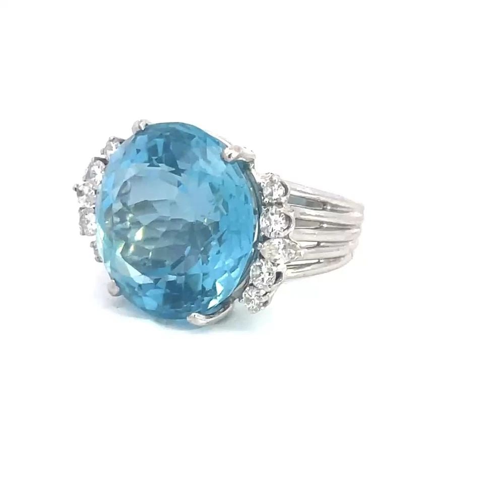 AQUAMARINE DIAMOND GOLD RING 12K WHITE LARGE COCKTAIL SPLIT SHANK: This is a stunning vintage cocktail ring, it is a piece of fine jewelry featuring a large round shaped aquamarine gemstone in the center with around and marquise shape sparling diamond accent on each 