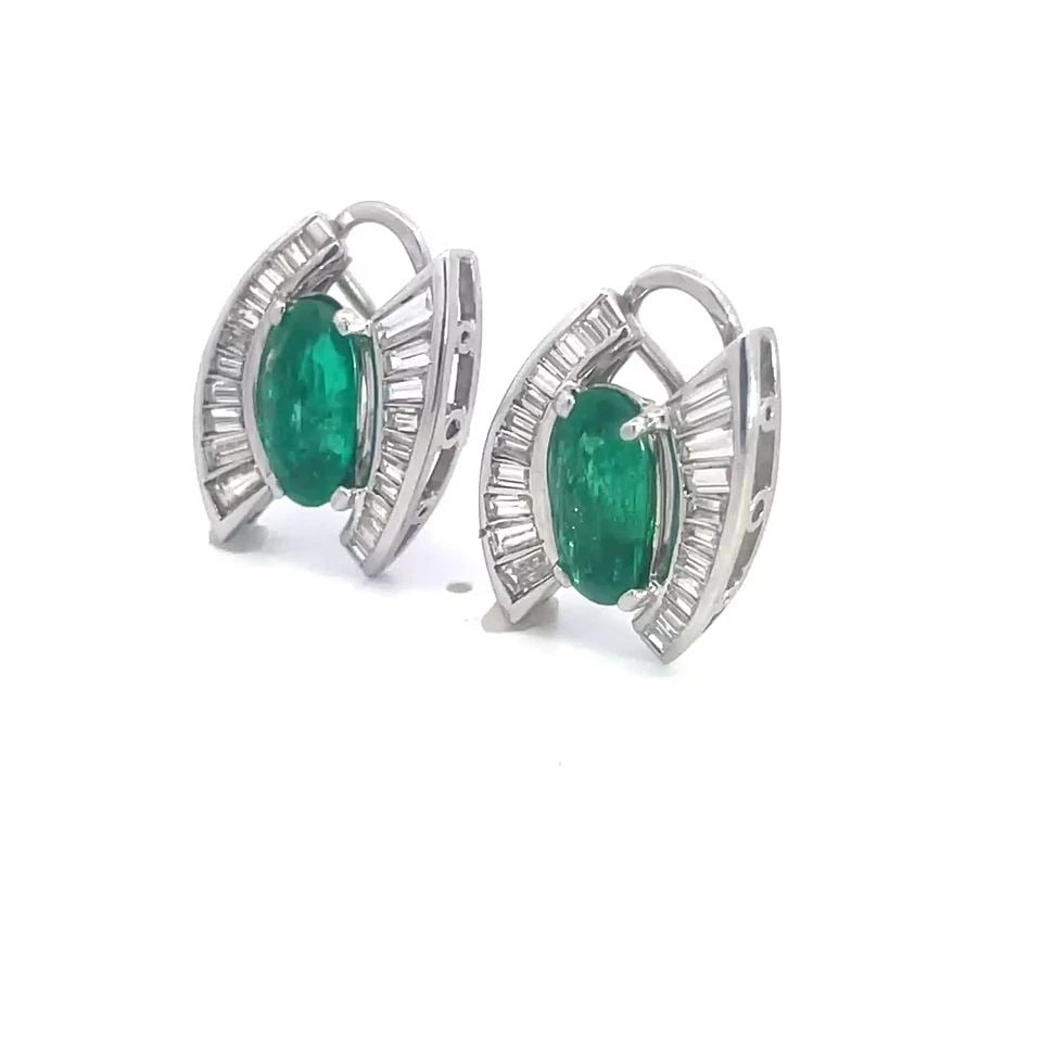 DIAMOND EMERALD PLATINUM EARRINGS 14K GOLD POST CLIP HUGGIE STYLE VINTAGE: DIAMOND EMERALD PLATINUM EARRINGS 14K GOLD POST CLIP HUGGIE STYLE VINTAGE This gorgeous pair of earrings are crafted from platinum with 14k white gold backs and posts. The front has open bracket like 