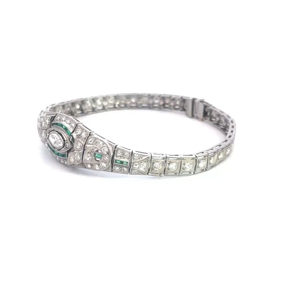 7496 DIAMOND PLATINUM BRACELET GEMSTONE FILIGREE MILGRAIN ART DECO: 7496 DIAMOND PLATINUM BRACELET GEMSTONE FILIGREE MILGRAIN ART DECO This lovely diamond and gold bracelet features intricate fine filigree design and a wide centerpiece with a large marquise diamond su