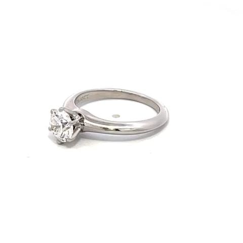 TIFFANY & CO. DIAMOND 0.85CT G VVS PLATINUM KNIFE EDGE SOLITAIRE RING GIA: TIFFANY & CO. DIAMOND 0.85CT G VVS PLATINUM KNIFE EDGE SOLITAIRE RING GIA This elegant authentic solitaire ring is from Tiffany & Co. The ring is crafted from platinum with a polished finish featuring
