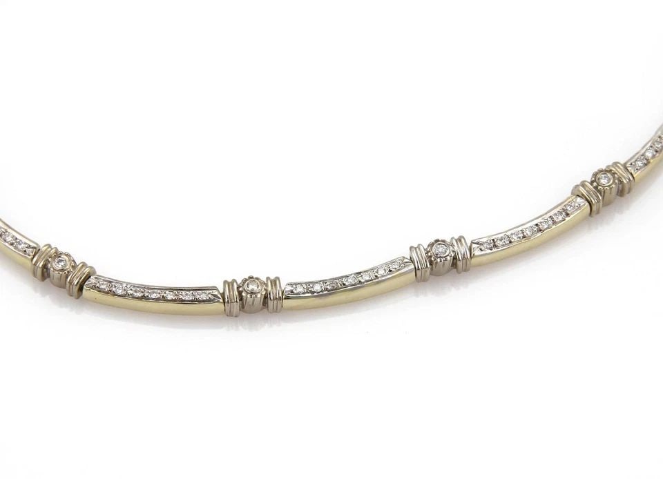 14K GOLD CURVED LINK NECKLACE TOE TONE SET WITH 1CT DIAMONDS: 14K GOLD CURVED LINK NECKLACE TOE TONE SET WITH 1CT DIAMONDS Estate 1.00 Carats Diamond 14k Two Tone Gold Long Curved Link Necklace Description This beautiful necklace is crafted from 14k yellow gold 