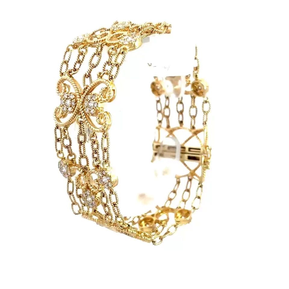 DIAMOND GOLD CHAIN LINK BRACELET 14K YELLOW SCROLL HEARTS &ROSETTES MOTIFS: DIAMOND GOLD CHAIN LINK BRACELET 14K YELLOW SCROLL HEARTS &ROSETTES MOTIFS This lovely bracelet is a stunning piece of fine jewelry made from 14k yellow gold. It features a beautiful design with scrol
