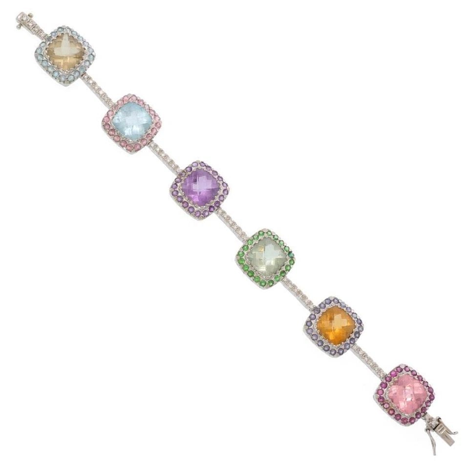 DIAMOND MULTICOLOR GEMS 18K WHITE GOLD 6 CUSHION BRACELET LIQUIDATION: DIAMOND MULTICOLOR GEMS 18K WHITE GOLD 6 CUSHION BRACELET Diamond Multicolor Gems 18k White Gold 6 Cushion Bracelet Description This is a lovely multi-color gemstone bracelet, crafted from 18k white g