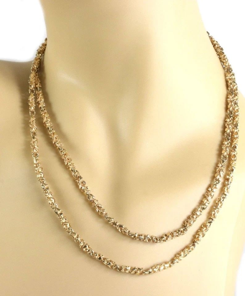 11K YELLOW GOLD 4MM THICK NUGGET LONG CHAIN 37": 11k Yellow Gold 4mm Thick Nugget Long Chain 37" !! Description This is a long nugget link chain, it is crafted from 11k yellow gold and has 59 short section links joined together. It is 4mm thick and 