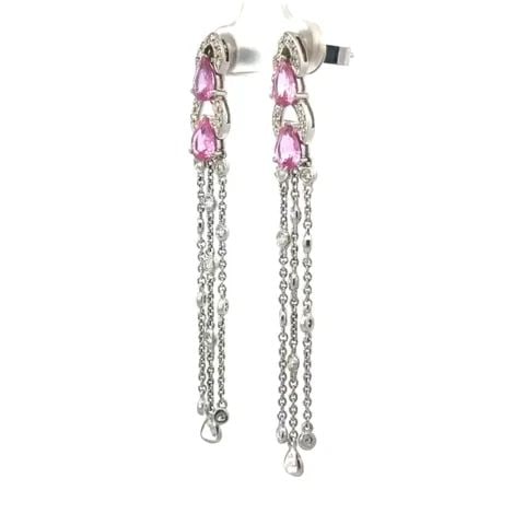 SAPPHIRE DIAMOND 18K GOLD EARRINGS PINK WHITE LONG DANGLE: SAPPHIRE DIAMOND 18K GOLD EARRINGS PINK WHITE LONG DANGLE These beautiful earrings are crafted from 18k white gold featuring 2 pear shaped pink sapphire stones at the top with flex open diamond bezel 