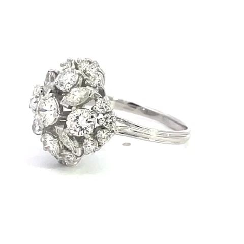 DIAMOND 18K MARQUEES WHITE GOLD DOME FLORAL TOP 2.5CT: DIAMOND 18K MARQUEES WHITE GOLD DOME FLORAL TOP 2.5CT This is a fabulous ring; the high gallery bridge and shank is crafted from 18k white gold with a polished finish. The top has an assortment of pro