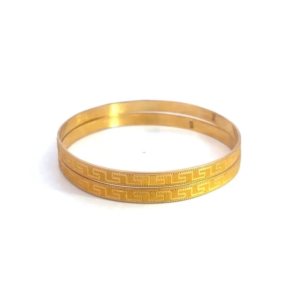 GOLD 21K BANGLES SET OF 2 GREEK KEY TEXTURED DESIGN 5MM WIDE FLAT BANDS: GOLD 21K BANGLES SET OF 2 GREEK KEY TEXTURED DESIGN 5MM WIDE FLAT BANDS This product is a set of two 21K yellow gold bangles with a Greek key textured design around the entire band. The bangles are 5m