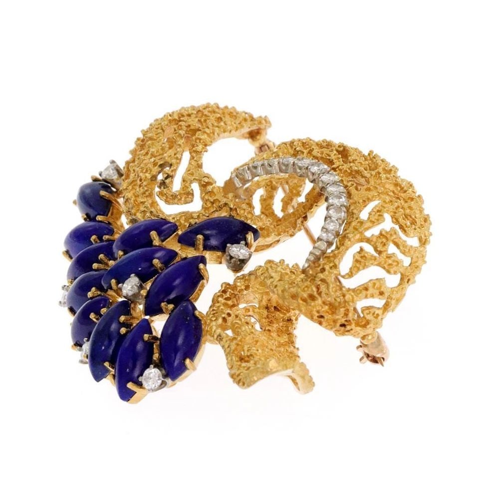LAPIS DIAMOND GOLD BROOCH FANCY FLORAL NUGGET 18K YELLOW 35 GRAMS: Diamond Lapis 18k Yellow Gold Fancy Floral Brooch Description This is a gorgeous Estate brooch, crafted from 18k yellow gold featuring a rough textured design ribbon bow accented with diamonds on whit