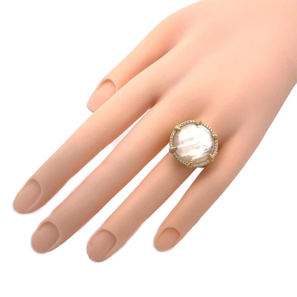JUDITH RIPKA DIAMOND MOTHER OF PEARL QUARTZ 18K GOLD RING LIQUIDATION: JUDITH RIPKA DIAMOND MOTHER OF PEARL QUARTZ 18K GOLD RING Judith Ripka 18k Gold Ring Description This authentic Judith Ripka ring is crafted from 18k yellow gold featuring a round top set with a facet