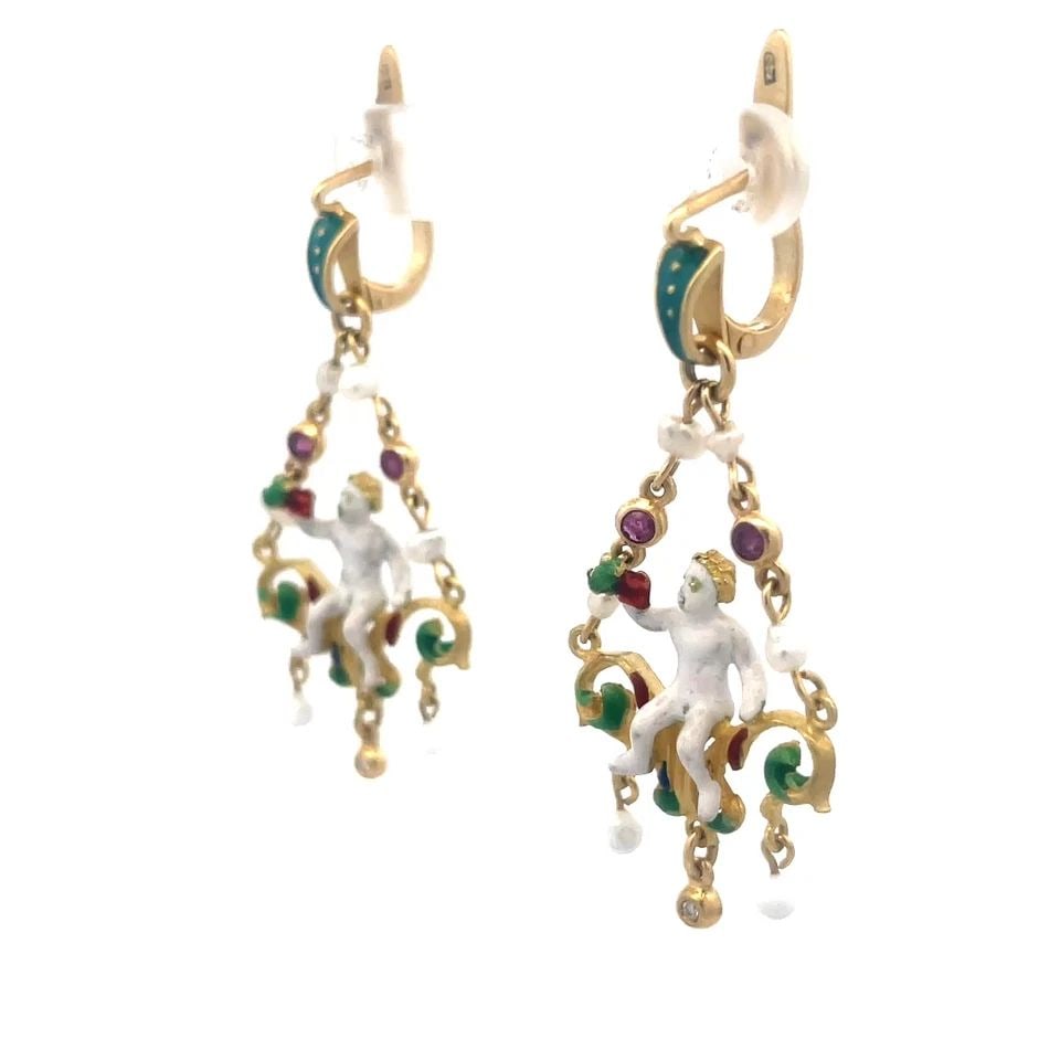 DIAMOND GOLD BABY BACCHUS EARRINGS 18K YELLOW RENAISSANCE REVIVAL STYLE: DIAMOND GOLD BABY BACCHUS EARRINGS 18K YELLOW RENAISSANCE REVIVAL STYLE The white enamel gold Baby Bacchus Earrings are a stunning pair of vintage pair in the Renaissance Revival style. Featuring whit