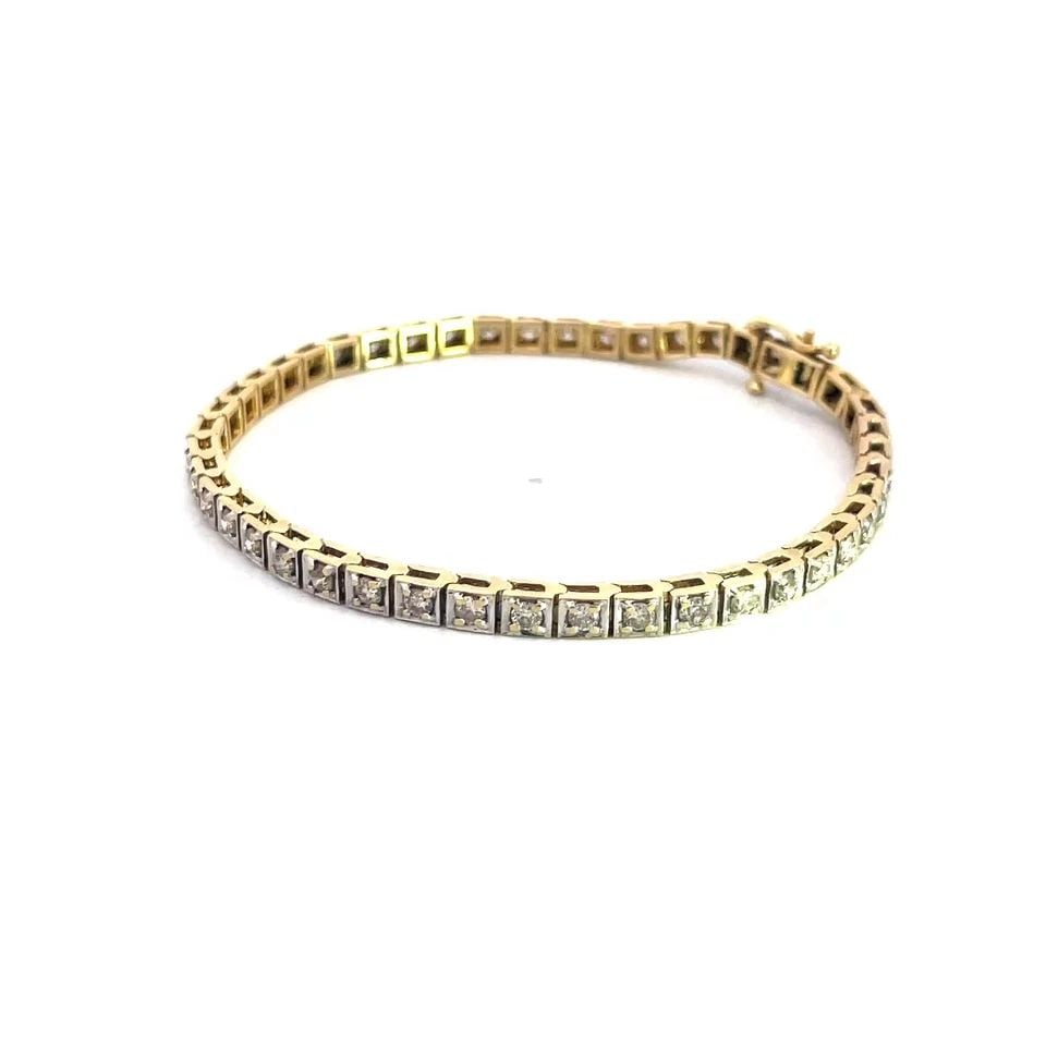 6958 DIAMOND GOLD TENNIS BRACELET 2.70CT SQUARE LINKS 14K TWO TONE: 6958 DIAMOND GOLD TENNIS BRACELET 2.70CT SQUARE LINKS 14K TWO TONE This is a timeless piece featuring a radiant array of sparkling diamonds, each meticulously set with yellow gold prong on white gold 