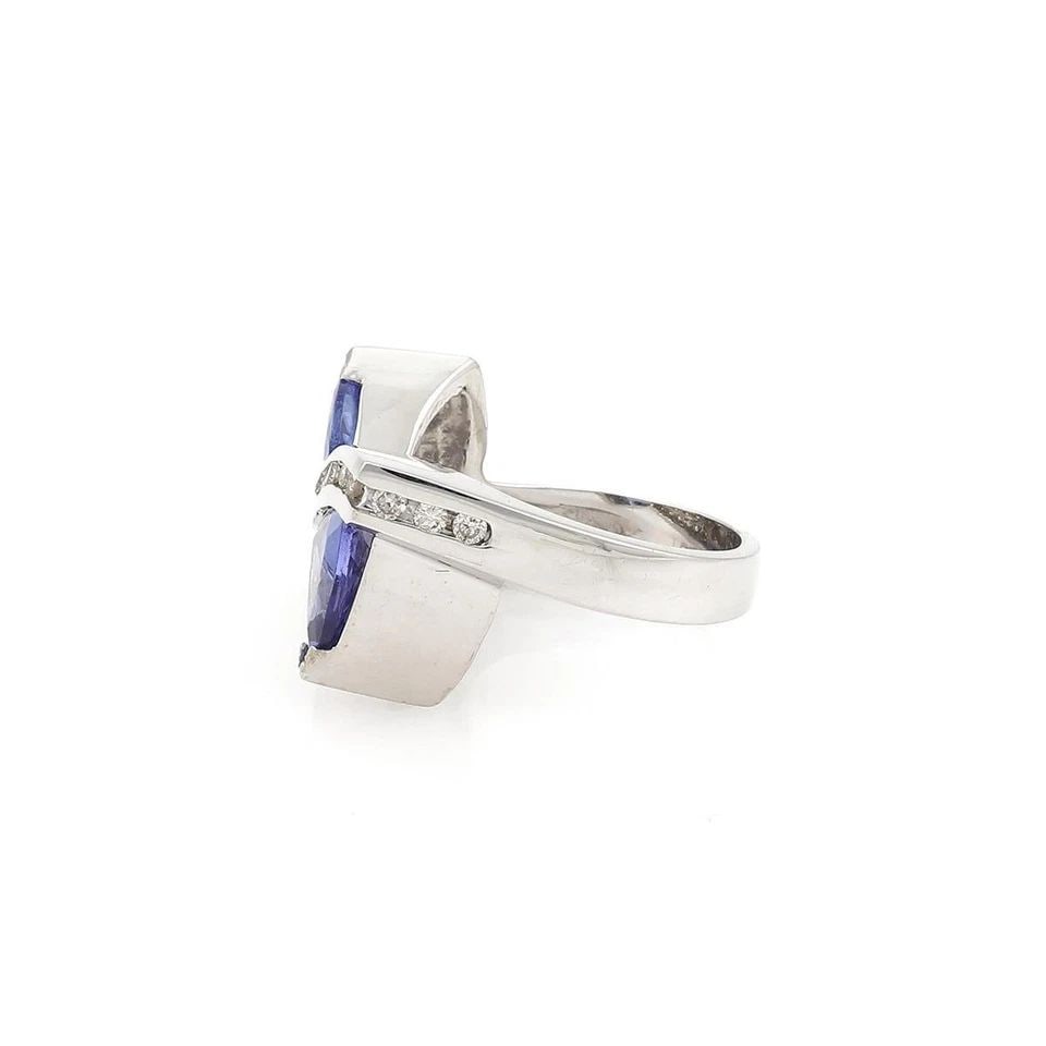 18K WHITE GOLD 2.95CT TANZANITE & DIAMOND FANCY BAND RING LIQUIDATION!: 18k White Gold 2.95ct Tanzanite & Diamond Fancy Band Ring ! Description This is a stunning fancy band ring, it is crafted from 18k white gold with a polished finish. The front has an X design with the